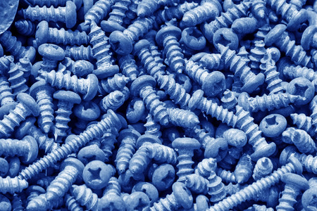 self-tapping screw piled up together, closeup of photoの写真素材