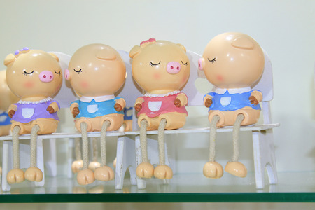 cartoon little piggy formative dolls on the store shelvesの写真素材