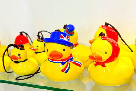 cartoon little yellow duck formative dolls on the store shelvesの写真素材
