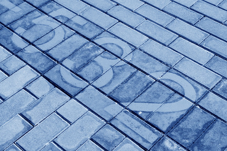 yellow numbers on color cement block, closeup of photoの写真素材