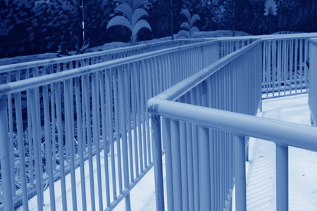 yellow metal railings in a playground, closeup of photoの写真素材