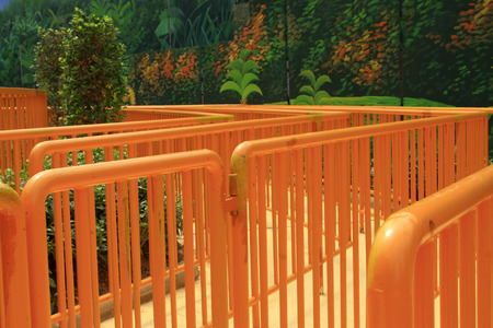 yellow metal railings in a playground, closeup of photoの写真素材