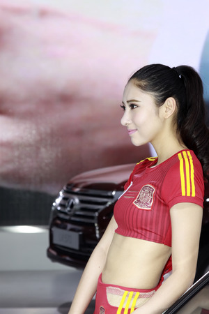 TANGSHAN - MAY 31: Beauty model in a car marketsï¼on may 31, 2014, Tangshan city, Hebei Province, Chinaのeditorial素材