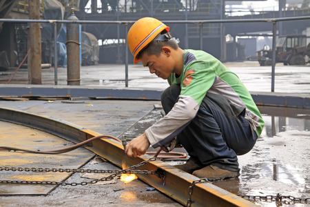 TANGSHAN - JUNE 18: Workers in production scenarios in iron and steel co., on June 18, 2014, Tangshan city, Hebei Province, China
のeditorial素材