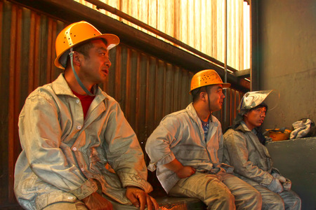 TANGSHAN - JUNE 18: workers have a short rest, in a iron and steel co., on June 18, 2014, Tangshan city, Hebei Province, Chinaのeditorial素材