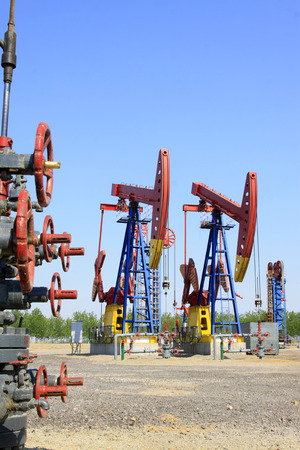 CAOFEIDIAN - MAY 2: crank balanced beam pumping unit in the JiDong oilfield, on may 2, 2014, caofeidian, hebei province, China. 
のeditorial素材