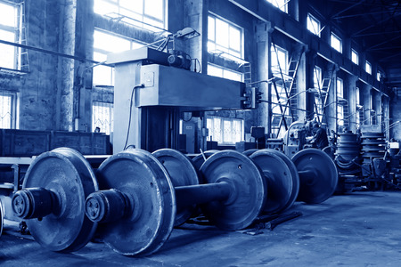 metal wheels in a workshop, closeup of photoの写真素材