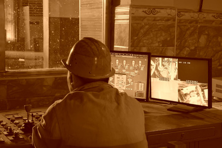 TANGSHAN - JUNE 19: steel mills converter workers tense work, on June 19, 2014, Tangshan city, Hebei Province, Chinaのeditorial素材
