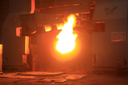 steel mills converter filling materials, closeup of photo