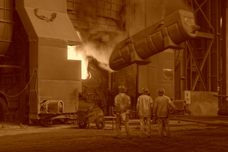 TANGSHAN - JUNE 20: steel mills converter workers tense work, on June 20, 2014, Tangshan city, Hebei Province, Chinaのeditorial素材