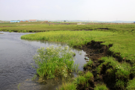 TULIGEN GRASSLAND - JULY 20: Tuligen River scenery in the grassland on July 20, 2014, Xilin gol...