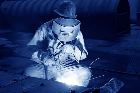 TANGSHAN CITY - JUNE 20: Worker welding parts in the production workshop, on June 20, 2014, Tangshan city, Hebei Province, China
のeditorial素材