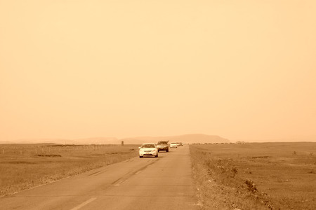 XILIN GOL LEAGUE - JULY 20: car driving on road in vast grassland, in the Xilin gol league on July 20, 2014, Inner Mongolia autonomous region, China. 
のeditorial素材