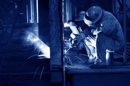 TANGSHAN CITY - JUNE 20: Worker welding parts in the production workshop, on June 20, 2014, Tangshan city, Hebei Province, China
のeditorial素材