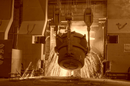 steel mills converter filling materials, closeup of photo