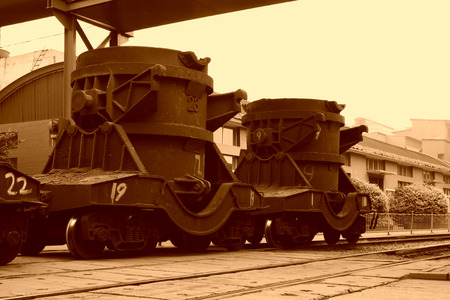 TANGSHAN - JUNE 20: Transportation molten iron crucible train, on June 20, 2014, Tangshan city, Hebei Province, Chinaのeditorial素材