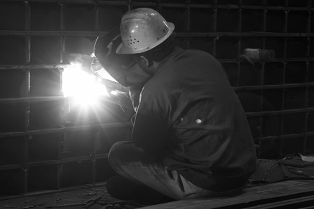 TANGSHAN CITY - JUNE 20: Worker welding parts in the production workshop, on June 20, 2014, Tangshan city, Hebei Province, China
のeditorial素材