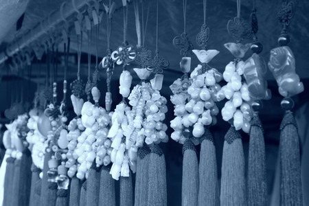 fine jade pendant in a shop, closeup of photoの写真素材
