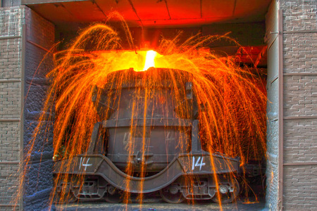 TANGSHAN - JUNE 20: Transportation molten iron crucible, on June 20, 2014, Tangshan city, Hebei Province, Chinaの写真素材