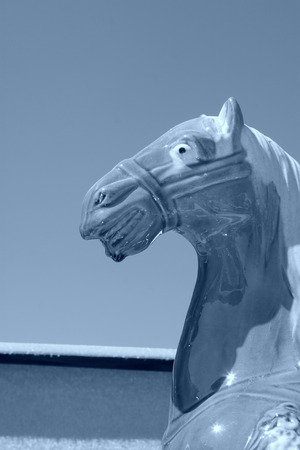 Ceramic horsehead under the blue sky, closeup of photoの写真素材