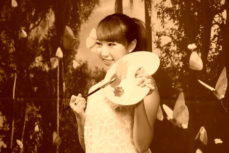 TANGSHAN CITY - AUGUST 22: Painting model in a commercial activity in a shop, on august 22, 2014, Tangshan City, Hebei Province, Chinaのeditorial素材