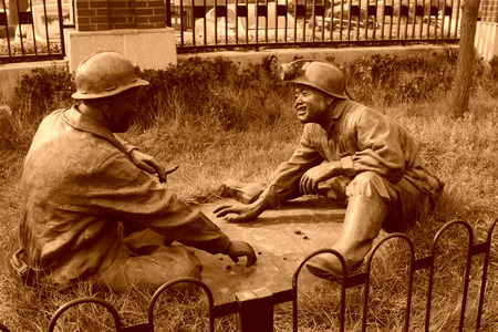 TANGSHAN - OCTOBER 18: The miners chess sculpture in the kailuan national mine park on october 18, 2013, tangshan city, hebei province, China.のeditorial素材