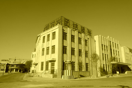 TANGSHAN - NOVEMBER 4: The words "long live the communist party" on the buildings, in the 1970 film and television base, November 4, 2013, tangshan city, hebei province, China.のeditorial素材