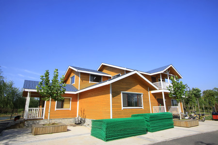 LUANNAN COUNTY - SEPTEMBER 15: Brown wooden cabin in a park on September 15, 2014, Luannan county, Hebei Province, Chinaのeditorial素材