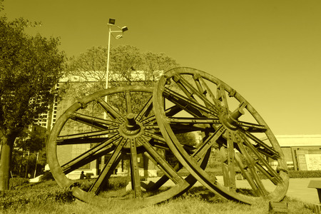 TANGSHAN - NOVEMBER 4: The giant wheel sculpture in the Kailuan national mine park on november 4, 2013, tangshan city, hebei province, China.のeditorial素材