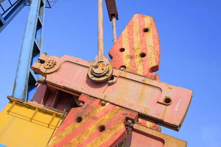 Balance parts of beam pumping unit, closeup of photoの写真素材