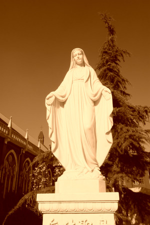 TANGSHAN - NOVEMBER 4: The Kept undefiled Notre Dame sculpture in a Catholic church on November 4, 2013, tangshan city, hebei province, China.の写真素材