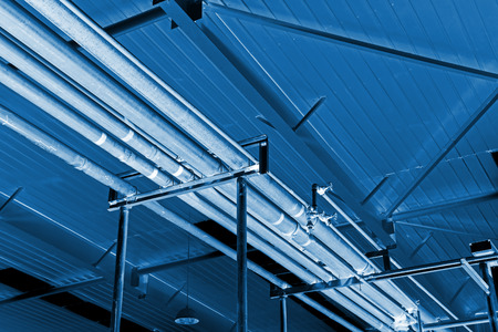 metal pipe in the factory, closeup of photoの写真素材