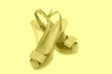 beautiful Women's high-heeled color sandals on a white backgroundの写真素材