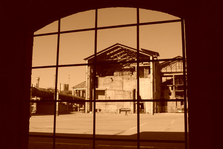 abandoned factories outside the window, closeup of photoの写真素材
