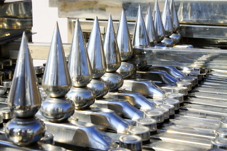 Stainless steel metal parts, closeup of photoの写真素材