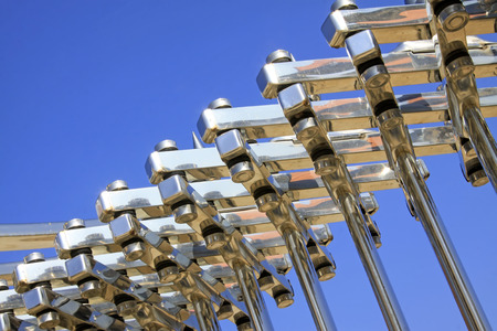 Stainless steel metal parts, closeup of photoの写真素材