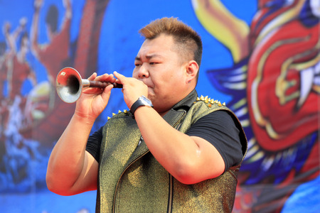 LUANNAN COUNTY - AUGUST 9: Obesity suona hand in the open air show, on august 9, 2014, Luannan...