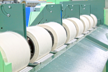 Cotton ball on the machine, closeup photoの写真素材