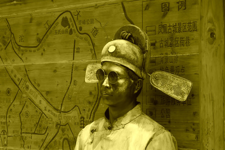 Phoenix County, April 15: Figure sculpture in the street on April 15, 2012, Phoenix County, Hunan...