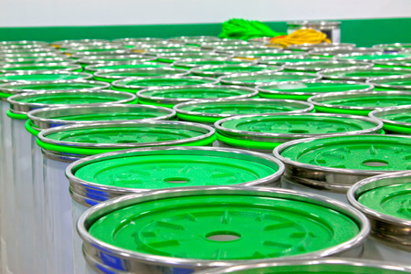green barrels lid in the workshop, closeup photoのeditorial素材