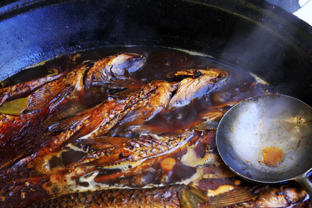 Chinese cuisine cooking - Large pot stewed fish in a restaurant