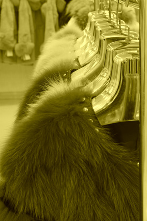 TANGSHAN CITY - NOVEMBER 16: The Fine fur clothing on hangers in a store, on november 16, 2013, tangshan city, hebei province, China.の写真素材