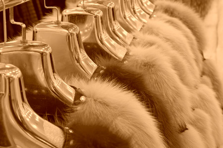 TANGSHAN CITY - NOVEMBER 16: The Fine fur clothing on hangers in a store, on november 16, 2013, tangshan city, hebei province, China.の写真素材