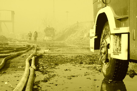 TANGSHAN - NOVEMBER 20: The prepare to leave the scene of the fire fighting vehicles and personnel after the fire, November 20, 2013, tangshan city, hebei province, China.のeditorial素材