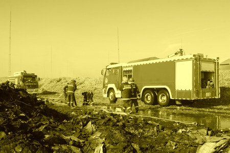 TANGSHAN - NOVEMBER 20: The prepare to leave the scene of the fire fighting vehicles and personnel after the fire, November 20, 2013, tangshan city, hebei province, China.のeditorial素材