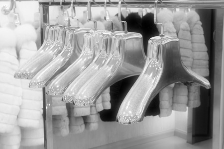 hangers in a shop, closeup of photoの写真素材