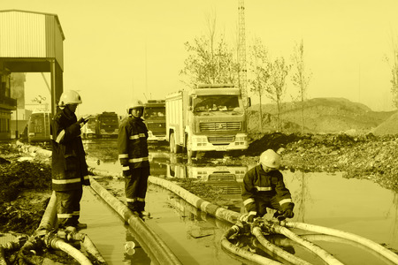 TANGSHAN - NOVEMBER 20: The firemen were control remote water supply pipeline in the scene of fire...