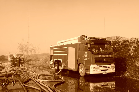 TANGSHAN - NOVEMBER 20: The prepare to leave the scene of the fire fighting vehicles and personnel after the fire, November 20, 2013, tangshan city, hebei province, China.のeditorial素材