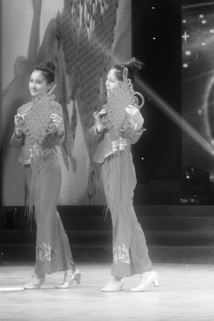 TANGSHAN - JANUARY 26: The chinese knot dance performance on stage, January 26, 2014, tangshan, china.のeditorial素材