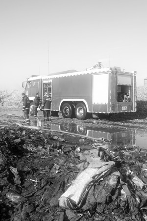 TANGSHAN - NOVEMBER 20: The prepare to leave the scene of the fire fighting vehicles and personnel...